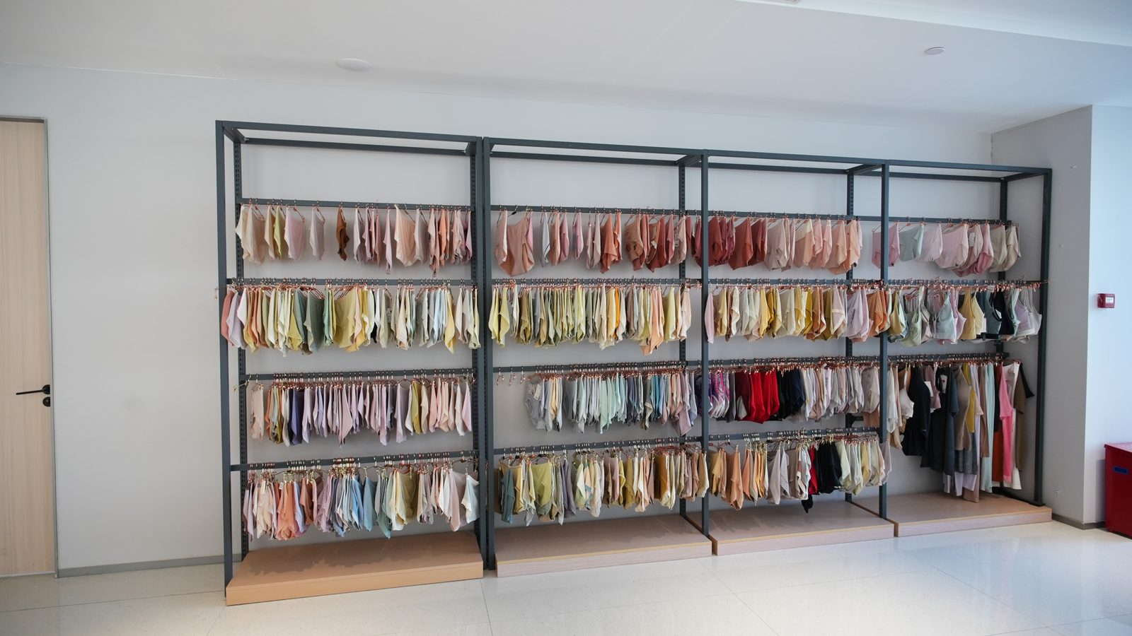 Fabric and material rack in the Dailys textile workshop