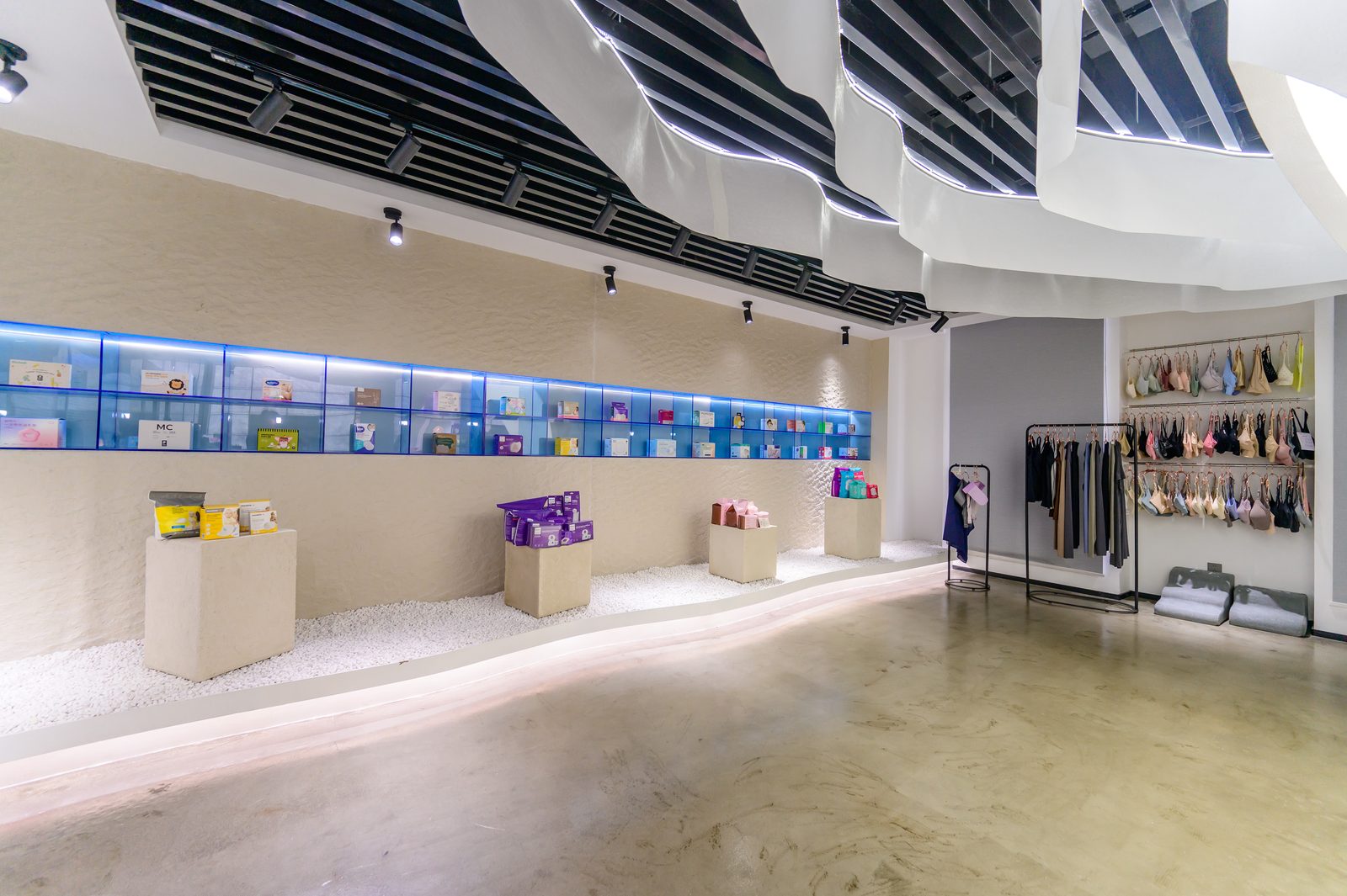 Dailys showroom wall displaying OEM feminine care products